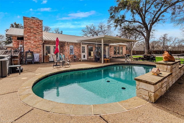 view of swimming pool featuring a fenced in pool and a patio