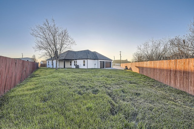 view of yard featuring a fenced backyard