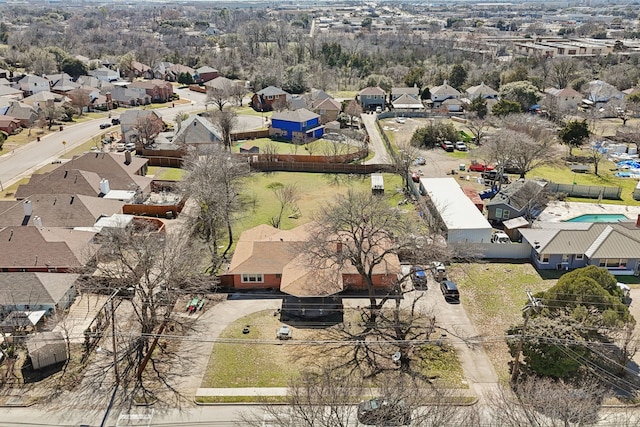 birds eye view of property with a residential view