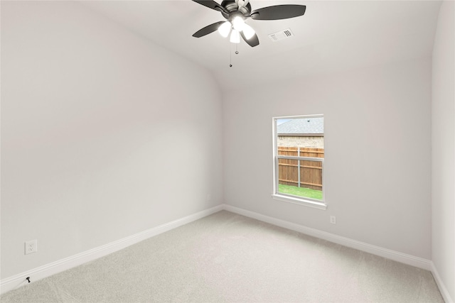 unfurnished room with baseboards, visible vents, and light carpet
