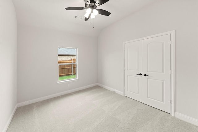 unfurnished bedroom with carpet floors and baseboards