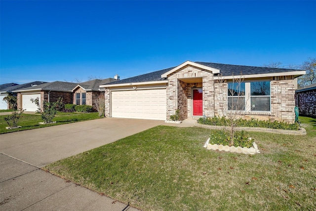 ranch-style home featuring a front yard, concrete driveway, brick siding, and an attached garage