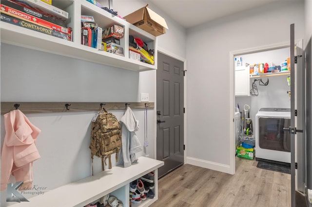 mudroom featuring baseboards and light wood-style floors