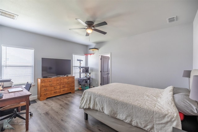 7001 Coldwater Dr, Abilene, TX 79601 - bedroom featuring wood finished floors, a desk, baseboards, and ceiling fan