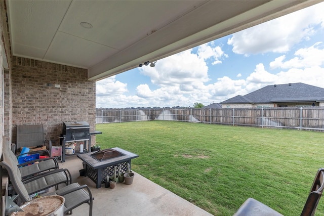 7001 Coldwater Dr, Abilene, TX 79601 - view of yard featuring a patio area and an outdoor fire pit