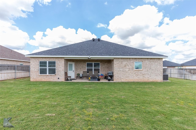 7001 Coldwater Dr, Abilene, TX 79601 - rear view of house featuring a patio, brick siding, roof with shingles, and central AC