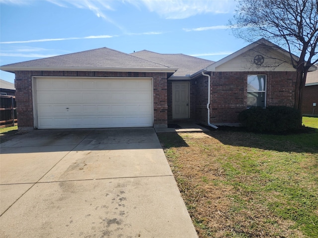 single story home featuring driveway, brick siding, a front lawn, and an attached garage