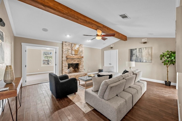 living room with a fireplace, dark wood-style flooring, and crown molding