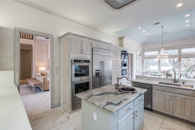 kitchen featuring appliances with stainless steel finishes, marble finish floor, visible vents, and a sink