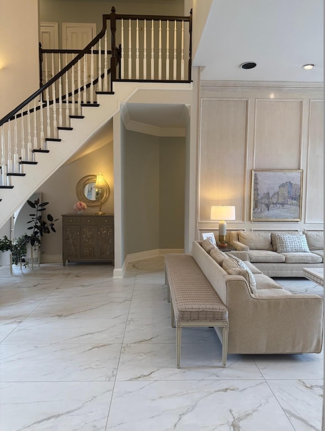 5415 Preston Fairways Cir, Dallas, TX 75252 - living area with recessed lighting, baseboards, marble finish floor, ornamental molding, and stairs