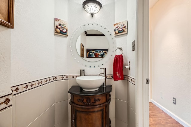 4212 Honeysuckle Dr, Mckinney, TX 75070 - bathroom featuring vanity and wood finished floors