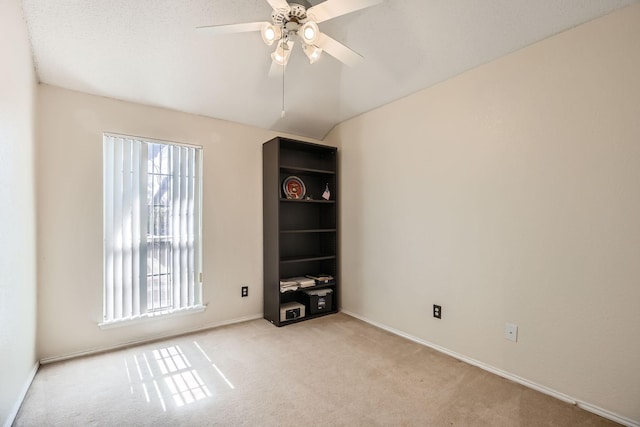 4212 Honeysuckle Dr, Mckinney, TX 75070 - empty room featuring ceiling fan, light colored carpet, and lofted ceiling