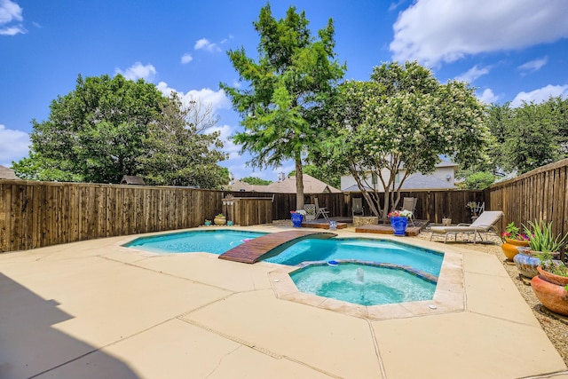 4212 Honeysuckle Dr, Mckinney, TX 75070 - view of pool with a patio, a fenced backyard, and a pool with connected hot tub