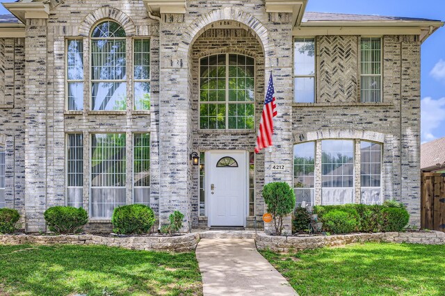 4212 Honeysuckle Dr, Mckinney, TX 75070 - doorway to property with brick siding