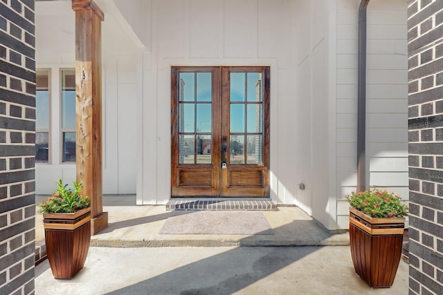 doorway to property featuring french doors