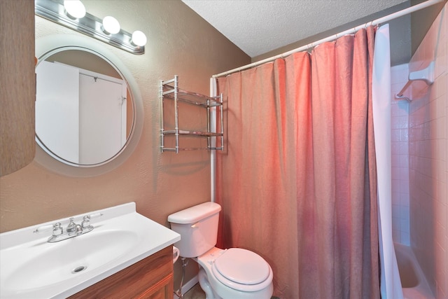 full bathroom featuring a textured wall, a textured ceiling, a shower with shower curtain, and vanity