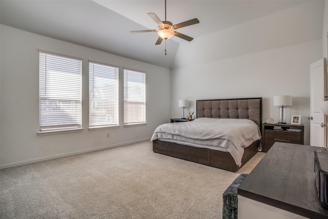 carpeted bedroom featuring baseboards, a ceiling fan, and lofted ceiling