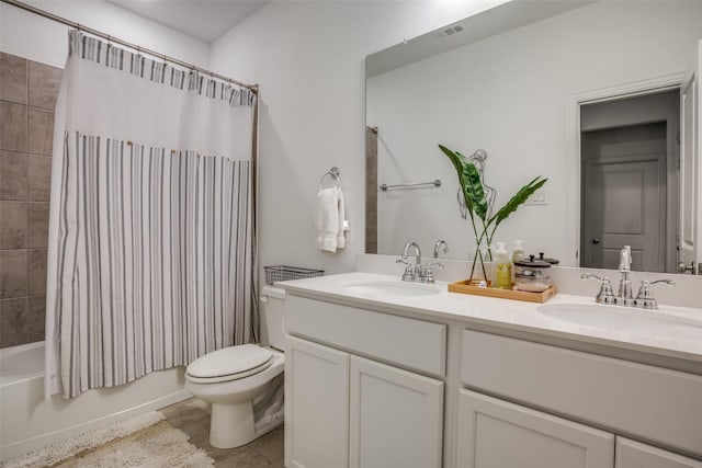 bathroom with visible vents, double vanity, a sink, and shower / bath combo with shower curtain