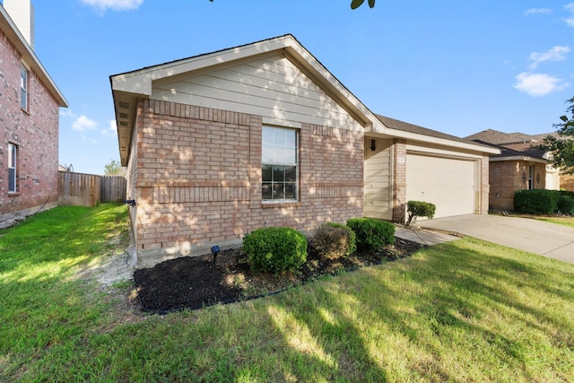 ranch-style house featuring a garage, brick siding, fence, driveway, and a front yard