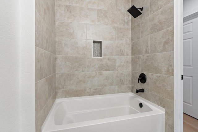 bathroom featuring  shower combination