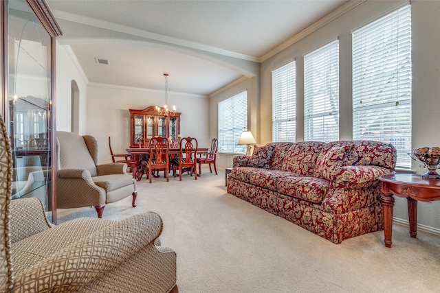 11451 La Grange Dr, Frisco, TX 75035 - living area with arched walkways, carpet flooring, ornamental molding, and a chandelier