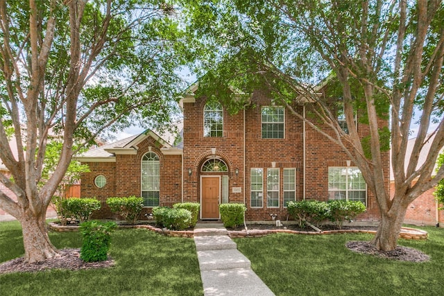 11451 La Grange Dr, Frisco, TX 75035 - view of front of property featuring a front lawn and brick siding