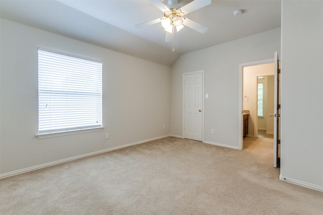 11451 La Grange Dr, Frisco, TX 75035 - unfurnished bedroom with light carpet, baseboards, lofted ceiling, and ceiling fan