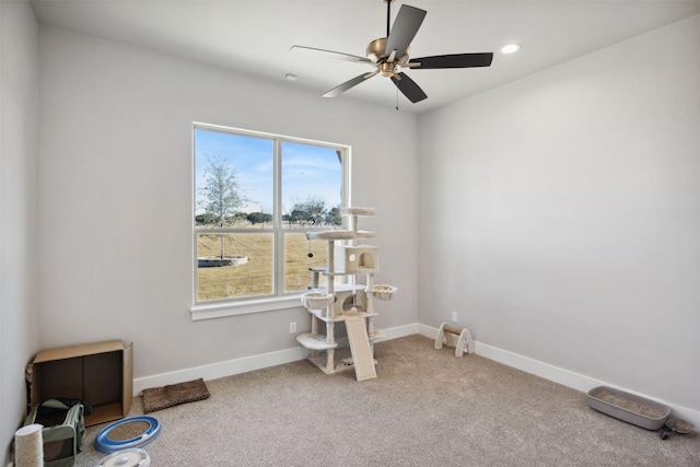 interior space with ceiling fan, recessed lighting, carpet, and baseboards