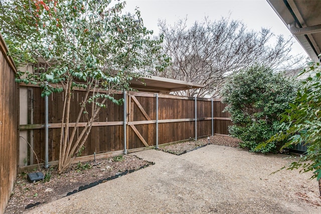 exterior space with a patio area and fence