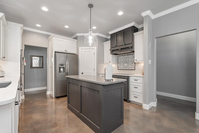 kitchen with stainless steel fridge, finished concrete floors, light countertops, white cabinetry, and pendant lighting