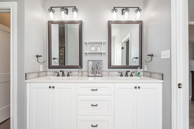 full bathroom featuring a sink and double vanity