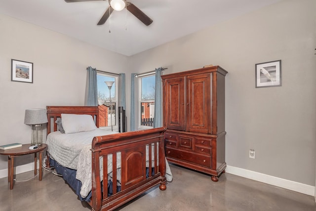 bedroom featuring concrete flooring, access to exterior, baseboards, and a ceiling fan