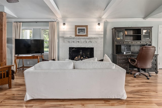 1501 Oak Shore Dr, Tool, TX 75143 - living area with ornamental molding, light wood finished floors, beam ceiling, and a fireplace