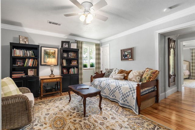 1501 Oak Shore Dr, Tool, TX 75143 - living room with crown molding, visible vents, ceiling fan, and wood finished floors