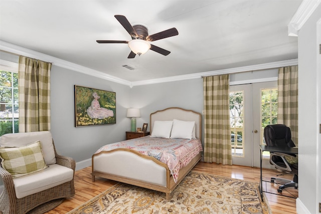1501 Oak Shore Dr, Tool, TX 75143 - bedroom with french doors, access to exterior, wood finished floors, and multiple windows