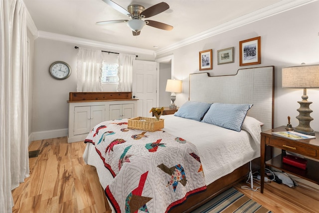 1501 Oak Shore Dr, Tool, TX 75143 - bedroom featuring baseboards, ornamental molding, ceiling fan, and light wood-style flooring