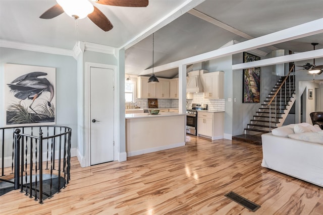 1501 Oak Shore Dr, Tool, TX 75143 - living room featuring visible vents, ceiling fan, light wood-type flooring, and baseboards