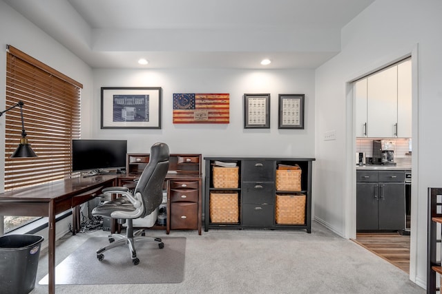 office space with light carpet, baseboards, and recessed lighting