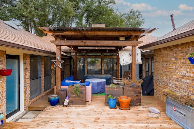 wooden terrace with an outdoor hangout area