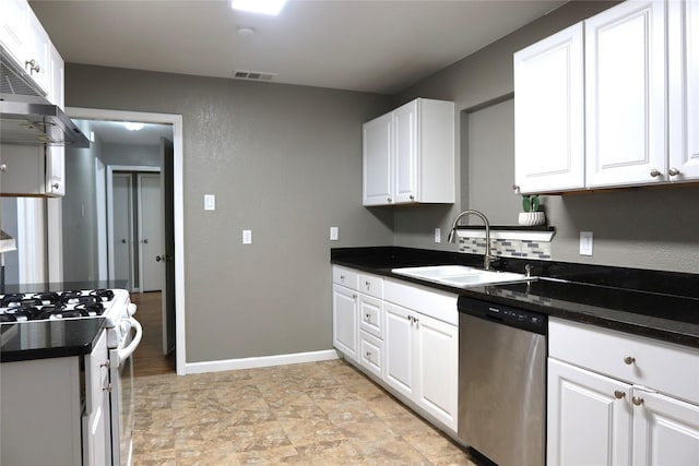 kitchen with white range with gas stovetop, a sink, visible vents, stainless steel dishwasher, and dark countertops