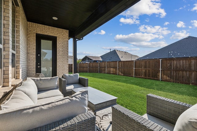 view of patio with a fenced backyard and an outdoor hangout area