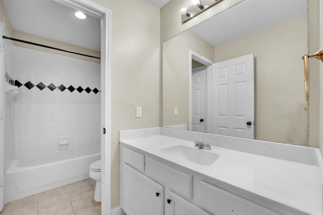 bathroom featuring shower / bath combination, vanity, toilet, and tile patterned floors