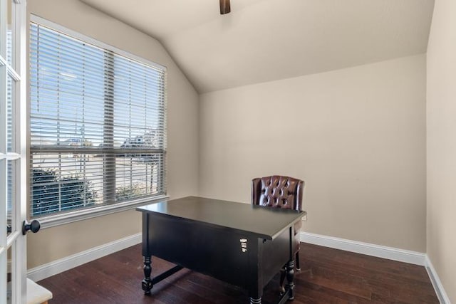 home office with lofted ceiling, dark wood-type flooring, and baseboards