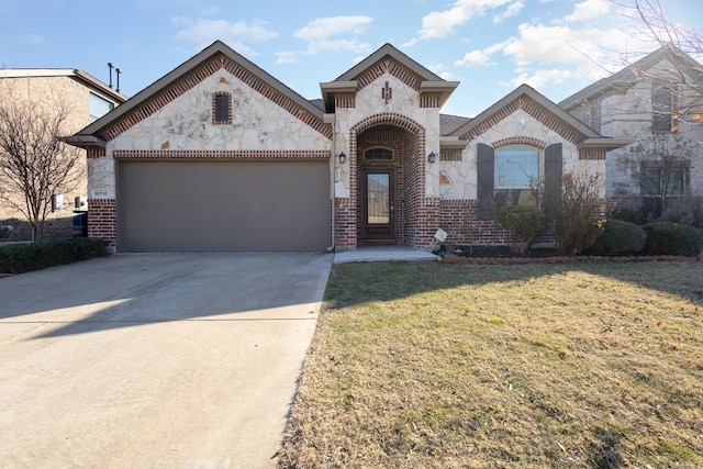 french provincial home with a front yard, brick siding, driveway, and an attached garage