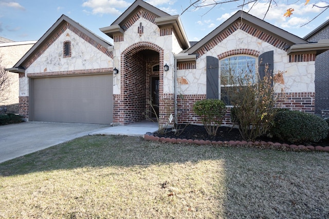 french provincial home featuring brick siding, concrete driveway, a garage, stone siding, and a front lawn