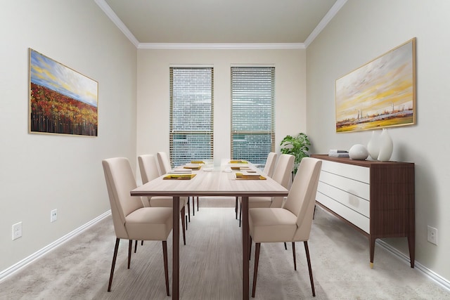 carpeted dining area with ornamental molding and baseboards