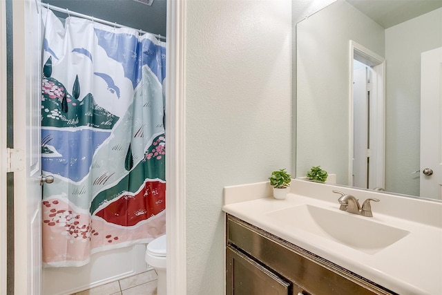 bathroom with shower / tub combo, tile patterned flooring, vanity, and toilet