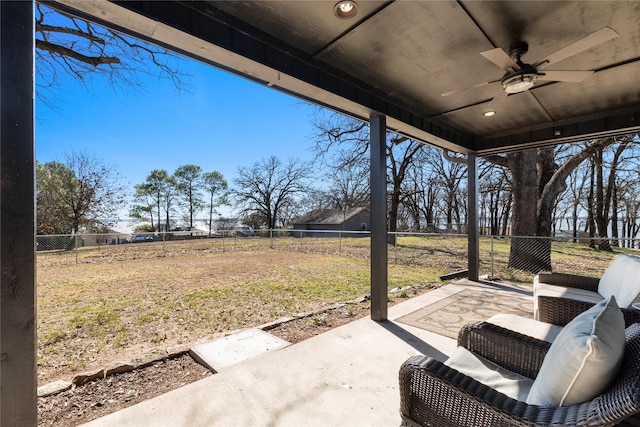 view of patio with a ceiling fan and a fenced backyard