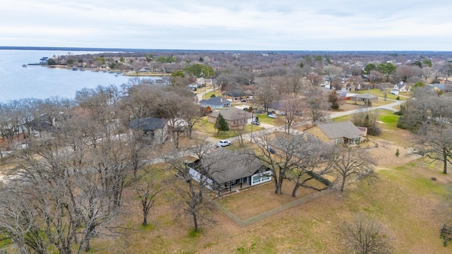 bird's eye view featuring a water view and a residential view