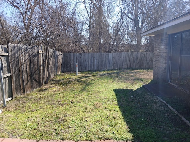 view of yard featuring a fenced backyard